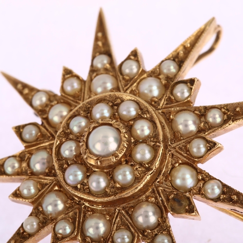 1107 - A large split pearl 9-ray starburst brooch/pendant, unmarked yellow metal closed-back settings, broo... 