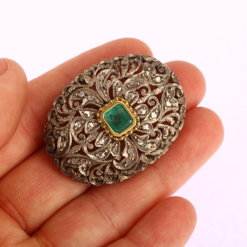 1109 - An emerald and diamond oval bombe brooch, unmarked gold and silver settings with central emerald ste... 