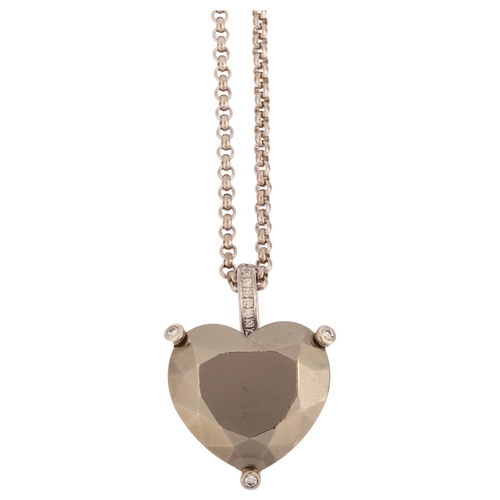 1111 - CHOPARD - an 18ct gold hematite and diamond heart pendant necklace, set with modern round brilliant-... 