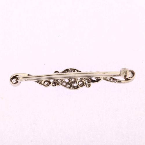 1112 - An Edwardian diamond bar brooch, unmarked white gold settings with old-cut diamonds, total diamond c... 