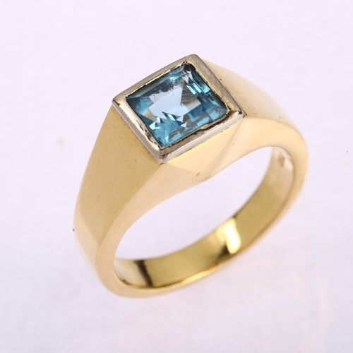 1118 - A heavy modern 18ct gold blue topaz signet ring, unsigned, setting height 10mm, size S, 18.3g