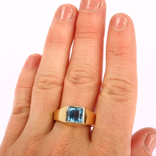 1118 - A heavy modern 18ct gold blue topaz signet ring, unsigned, setting height 10mm, size S, 18.3g