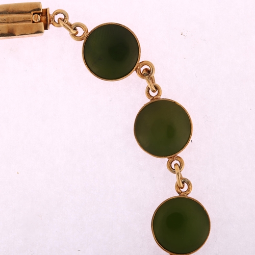 1120 - An early 20th century jade panel bracelet, unmarked rose gold closed-back settings, jade diameter 10... 