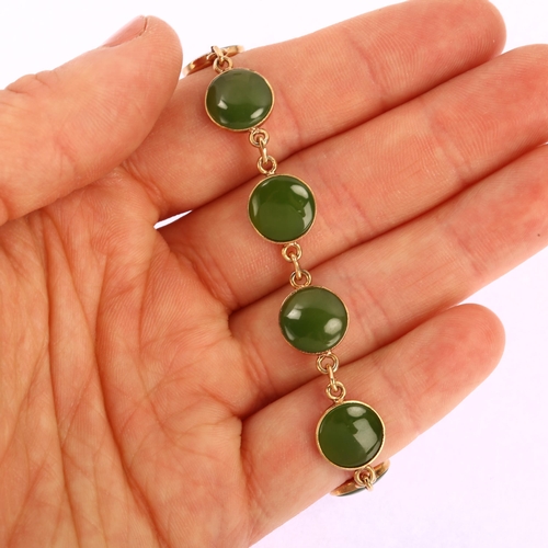 1120 - An early 20th century jade panel bracelet, unmarked rose gold closed-back settings, jade diameter 10... 