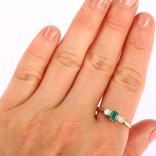 1122 - An 18ct gold three stone emerald and diamond ring, set with 0.25ct emerald step-cut emerald and roun... 
