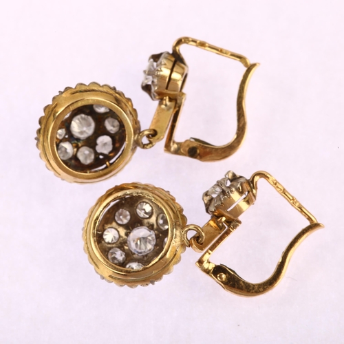 1123 - A pair of Continental diamond cluster drop earrings, unmarked gold and silver settings with French l... 