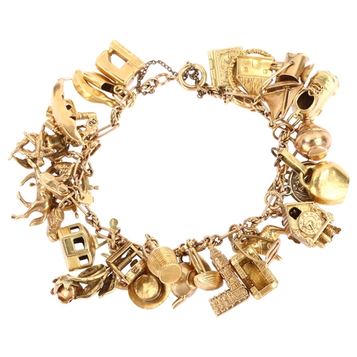 1124 - An unmarked rose gold charm bracelet, with various 18ct 14ct 9ct and silver charms, bracelet length ... 