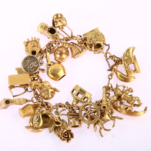 1124 - An unmarked rose gold charm bracelet, with various 18ct 14ct 9ct and silver charms, bracelet length ... 
