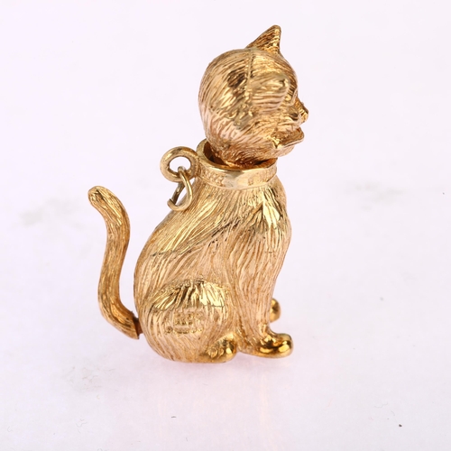 1126 - A heavy late 20th century 9ct rose gold articulated seated cat charm/pendant, maker's mark R Co, Lon... 