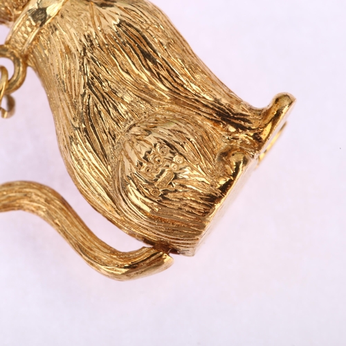 1126 - A heavy late 20th century 9ct rose gold articulated seated cat charm/pendant, maker's mark R Co, Lon... 