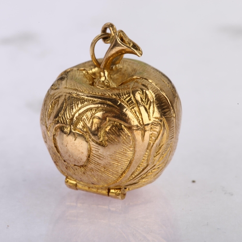 1128 - A mid-20th century 9ct gold Adam Eve and the Apple kinetic charm/pendant, opening to reveal enamel f... 