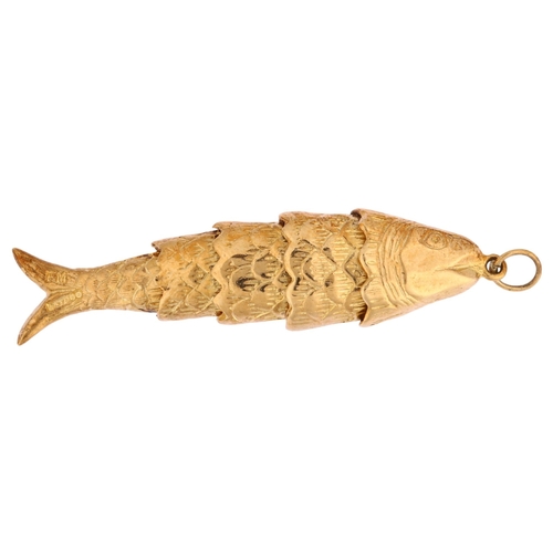 1129 - A mid-20th century 9ct gold articulated fish charm/pendant, maker's marks FM, London 1962, length 45... 