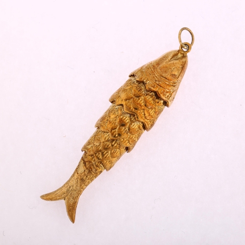 1129 - A mid-20th century 9ct gold articulated fish charm/pendant, maker's marks FM, London 1962, length 45... 