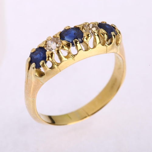 1139 - An early 20th century graduated five stone sapphire and diamond half hoop ring, unmarked 18ct gold s... 