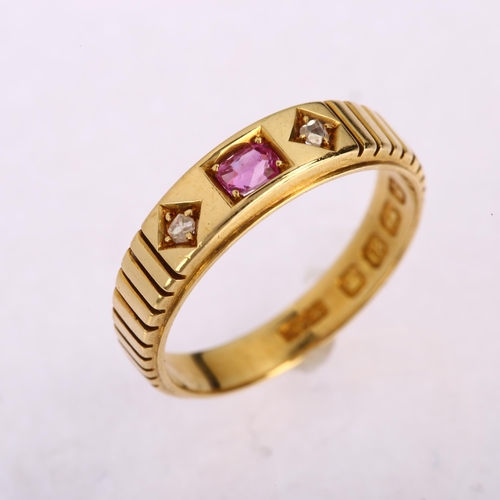 1143 - A Victorian 18ct gold three stone ruby and diamond ring, maker's marks WGM, Birmingham 1881, setting... 