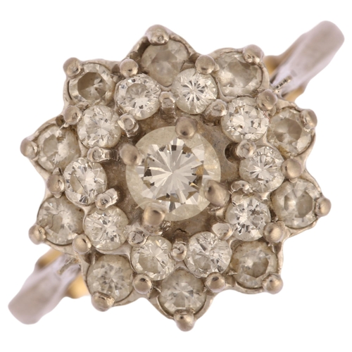 1146 - A late 20th century diamond cluster ring, unmarked white metal settings with modern round brilliant-... 