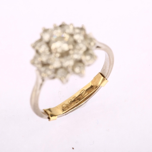 1146 - A late 20th century diamond cluster ring, unmarked white metal settings with modern round brilliant-... 