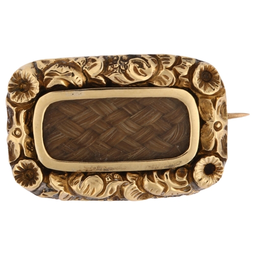 1147 - A Georgian woven hair memorial brooch, unmarked gold closed-back settings with floral border and cen... 