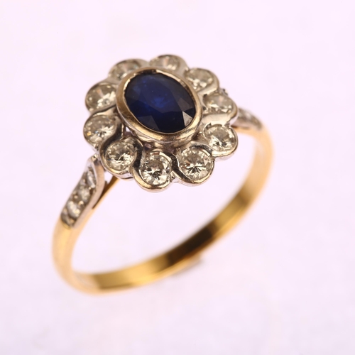 1151 - A modern 18ct gold sapphire and diamond oval cluster ring, set with oval mixed-cut sapphire and mode... 