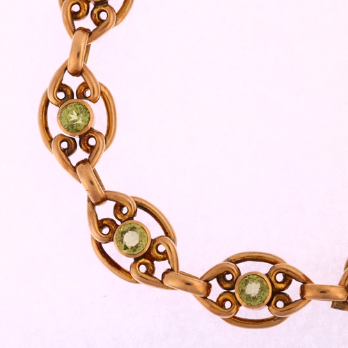 1164 - An Edwardian 9ct gold peridot panel bracelet, length 18cm, 13.5g