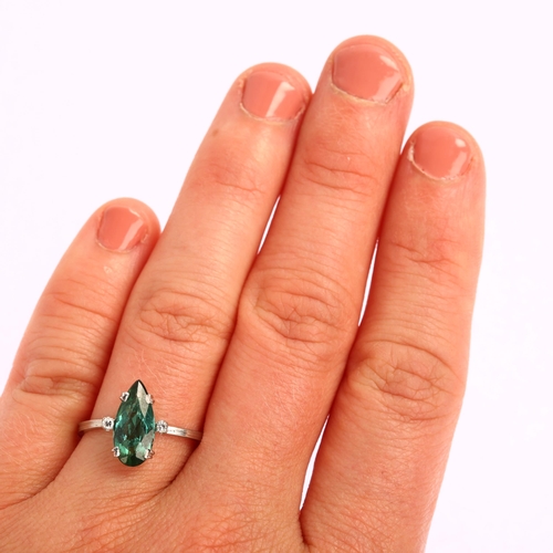 1165 - A modern 18ct white gold green tourmaline and diamond ring, set with long pear-cut tourmaline and si... 