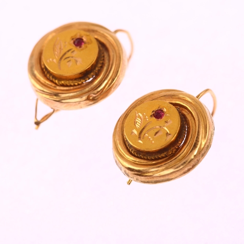 1168 - A pair of Victorian garnet earrings, unmarked gold settings with engraved floral decoration and shep... 