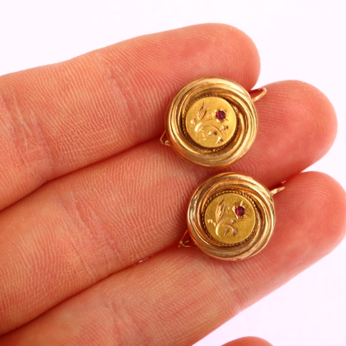 1168 - A pair of Victorian garnet earrings, unmarked gold settings with engraved floral decoration and shep... 