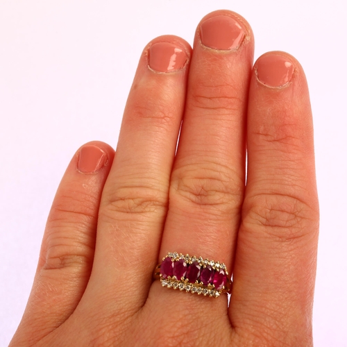 1181 - A modern 9ct gold ruby and diamond half hoop ring, set with oval mixed-cut rubies and modern round b... 