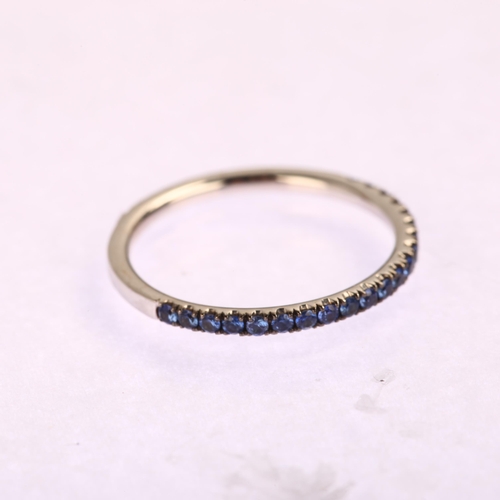 1182 - A modern 18ct white gold tanzanite half eternity ring, set with round-cut tanzanite, Verifine, band ... 