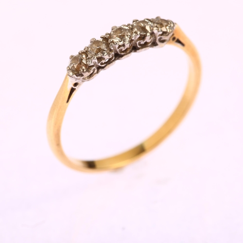 1185 - An early 20th century five stone diamond ring, unmarked 18ct gold settings set with old-cut diamonds... 