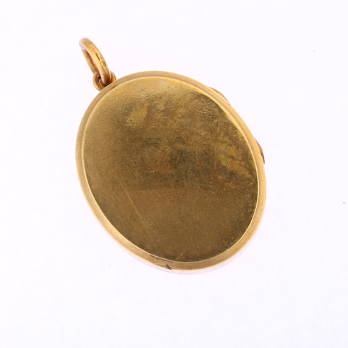 1186 - A Victorian gilt-metal photo locket pendant, with applied monogram AEI, pendant height 44mm, 14.8g