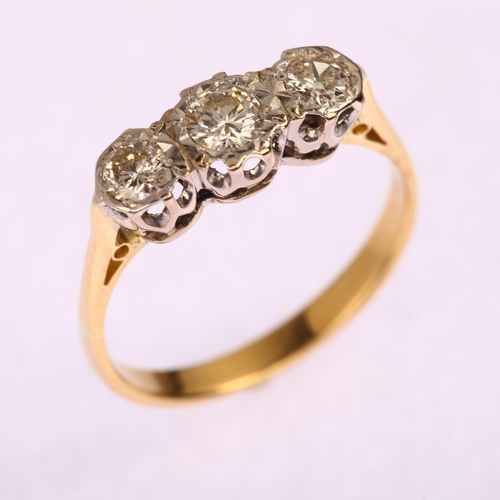 1187 - A mid-20th century three stone diamond ring, unmarked 18ct gold illusion settings with modern round ... 