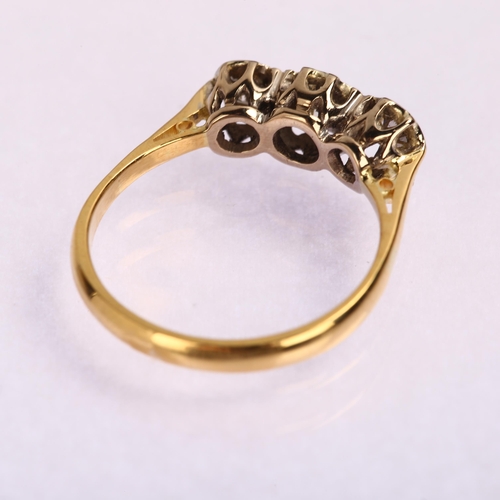 1187 - A mid-20th century three stone diamond ring, unmarked 18ct gold illusion settings with modern round ... 