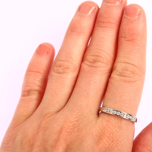 1198 - A modern 18ct white gold diamond half eternity ring, channel set with modern round brilliant-cut dia... 