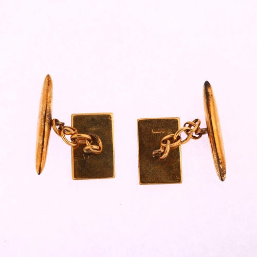 1207 - A pair of Art Deco 9ct gold cufflinks, rectangular and torpedo panels with engine turned decoration,... 