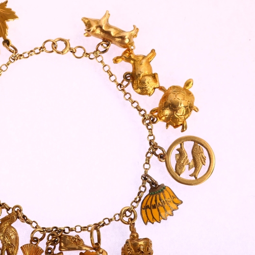 1213 - A 9ct gold double belcher link chain charm bracelet, with various 9ct gold and silver charms, bracel... 