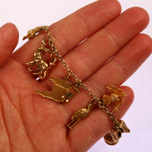 1213 - A 9ct gold double belcher link chain charm bracelet, with various 9ct gold and silver charms, bracel... 