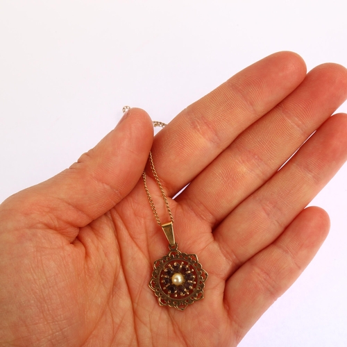 1222 - A modern 9ct gold cultured pearl and garnet flowerhead cluster pendant necklace, on 9ct fine cable l... 