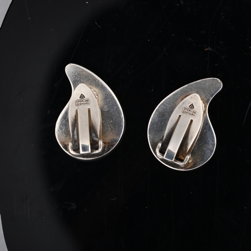 1253 - ANTON MICHELSEN - a pair of Danish modernist sterling silver concave teardrop clip-on earrings, desi... 