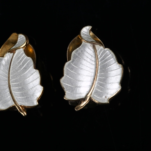 1263 - VOLMER BAHNER - a pair of Danish vermeil sterling silver and white enamel leaf clip-on earrings, hei... 