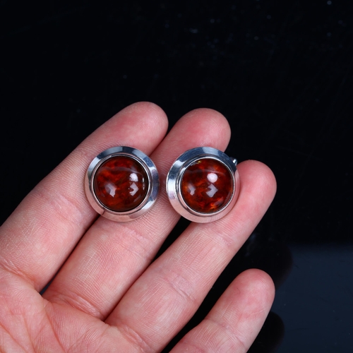 1274 - NIELS ERIK FROM - a pair of Danish modernist sterling silver and amber cufflinks, panel diameter 20.... 