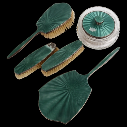 1455 - A George V Art Deco silver and green enamel 5-piece dressing table set, comprising hand mirror, 1 x ... 