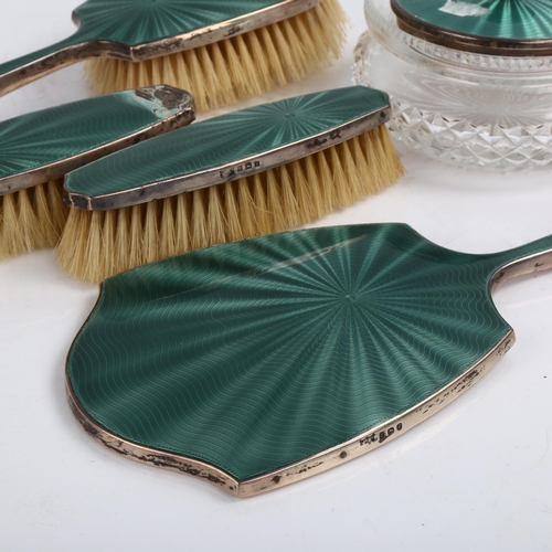 1455 - A George V Art Deco silver and green enamel 5-piece dressing table set, comprising hand mirror, 1 x ... 