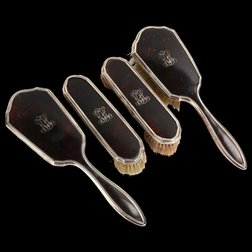 1457 - A George V Art Deco silver and tortoiseshell 4-piece dressing table set, comprising 2 x hairbrushes,... 