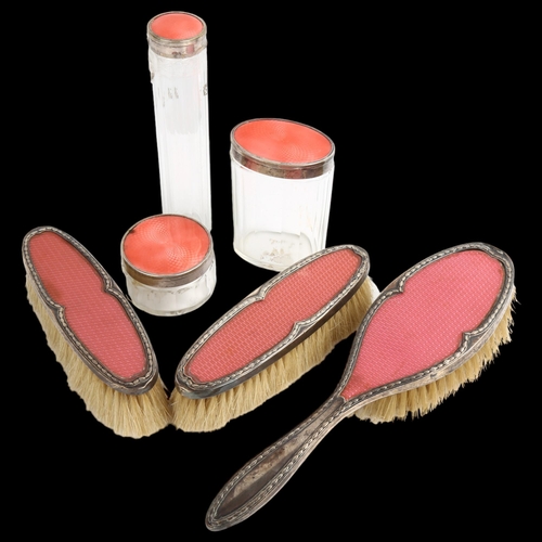 1459 - A George V Art Deco silver and pink celluloid 3-piece dressing table set, comprising hairbrush and 2... 