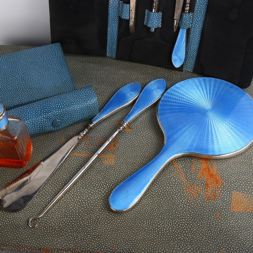 1460 - A George V Art Deco silver and blue enamel travelling vanity set, retailed by Finnigans, Henry Matth... 