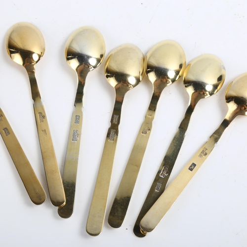 1464 - ANTON MICHELSEN - a set of 7 Danish vermeil sterling silver and harlequin enamel coffee spoons, leng... 