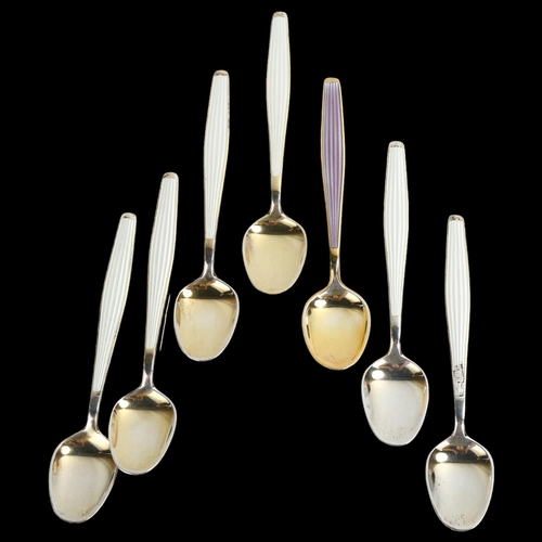 1467 - A set of 7 Norwegian vermeil sterling silver and harlequin enamel coffee spoons, maker's marks JT, l... 