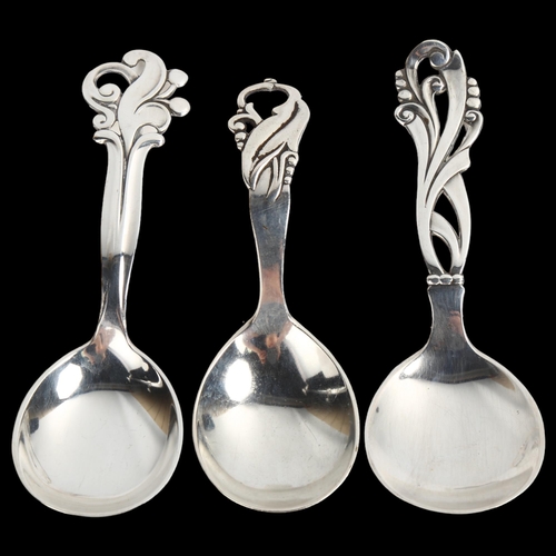 1471 - 3 Danish stylised silver preserve spoons, with pierced floral handles, largest length 11cm