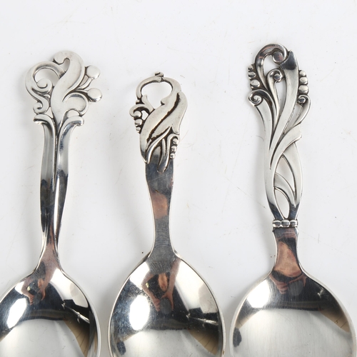 1471 - 3 Danish stylised silver preserve spoons, with pierced floral handles, largest length 11cm